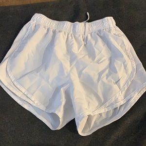 White Nike shorts